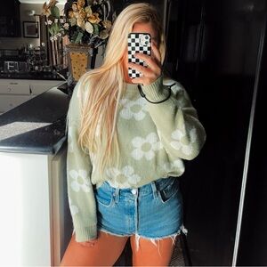Green and white flower knit sweater